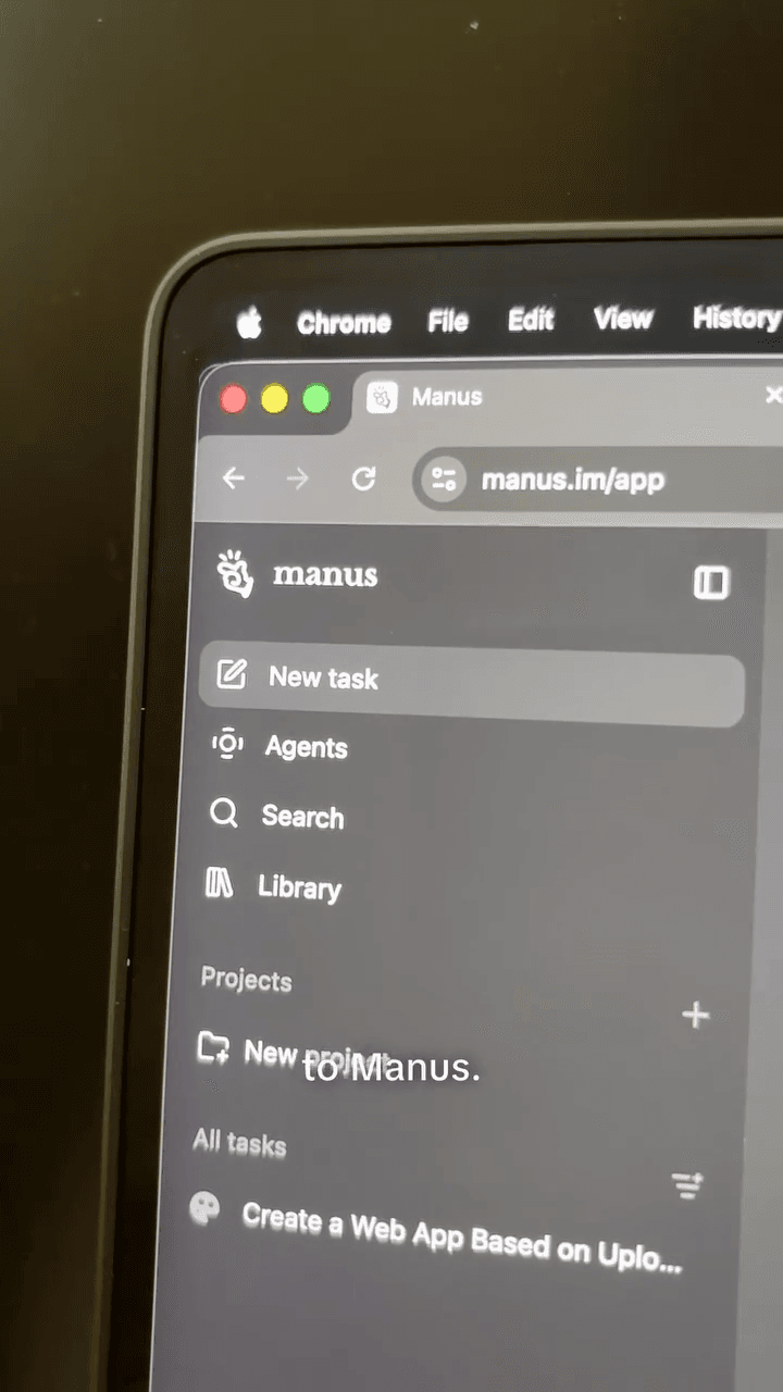 An original creator video showing the Manus interface on a laptop